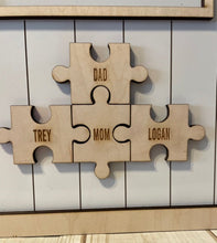 Load image into Gallery viewer, Family is what holds all the pieces together, puzzle pieces, family sign
