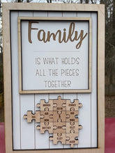 Load image into Gallery viewer, Family is what holds all the pieces together, puzzle pieces, family sign
