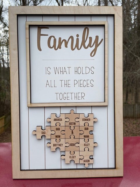 Family is what holds all the pieces together, puzzle pieces, family sign