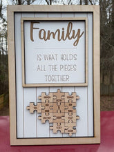 Load image into Gallery viewer, Family is what holds all the pieces together, puzzle pieces, family sign
